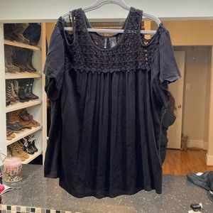 Brand new X-Large women’s top black. New Directions